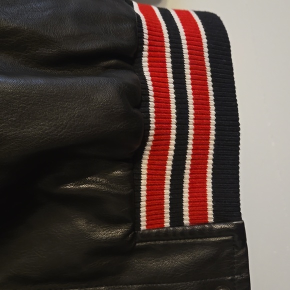 Buttermelon Black Faux Leather Varsity Bomber Jacket with Red & White Trim - Picture 3 of 8